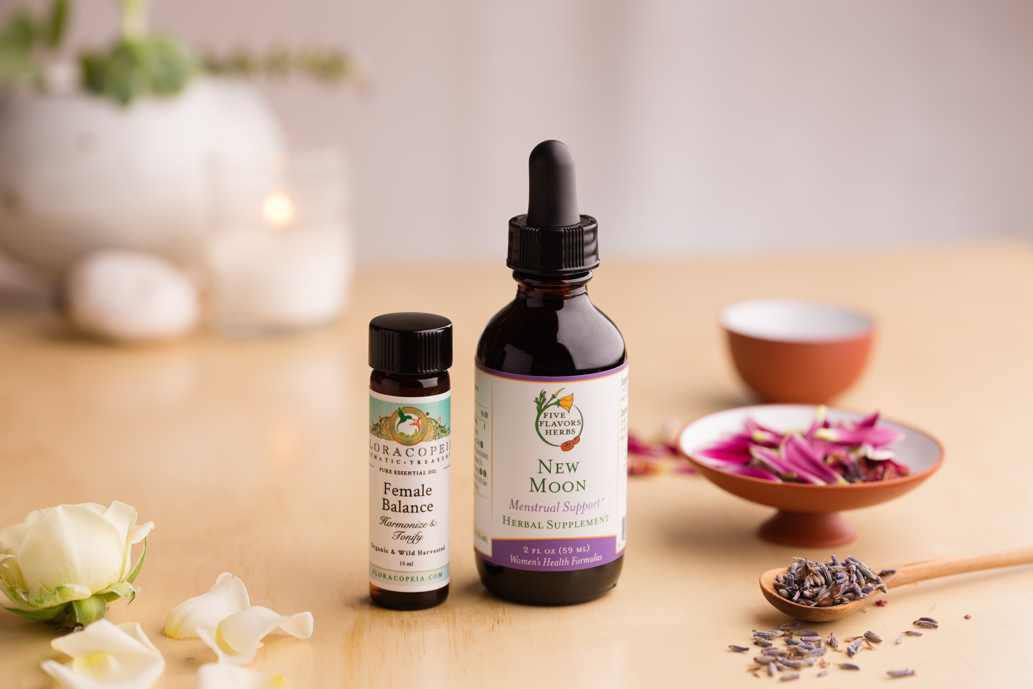 new-moon-womens-health-tincture-and-womens-balance-essential-oil-with-lavender-petals-and-roses